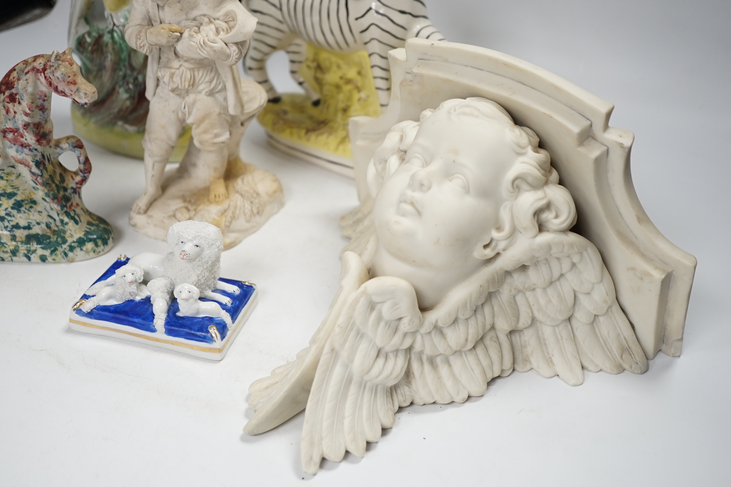 A Staffordshire spongeware rider on horseback, a Staffordshire pheasant, and three other items, pheasant 26cm